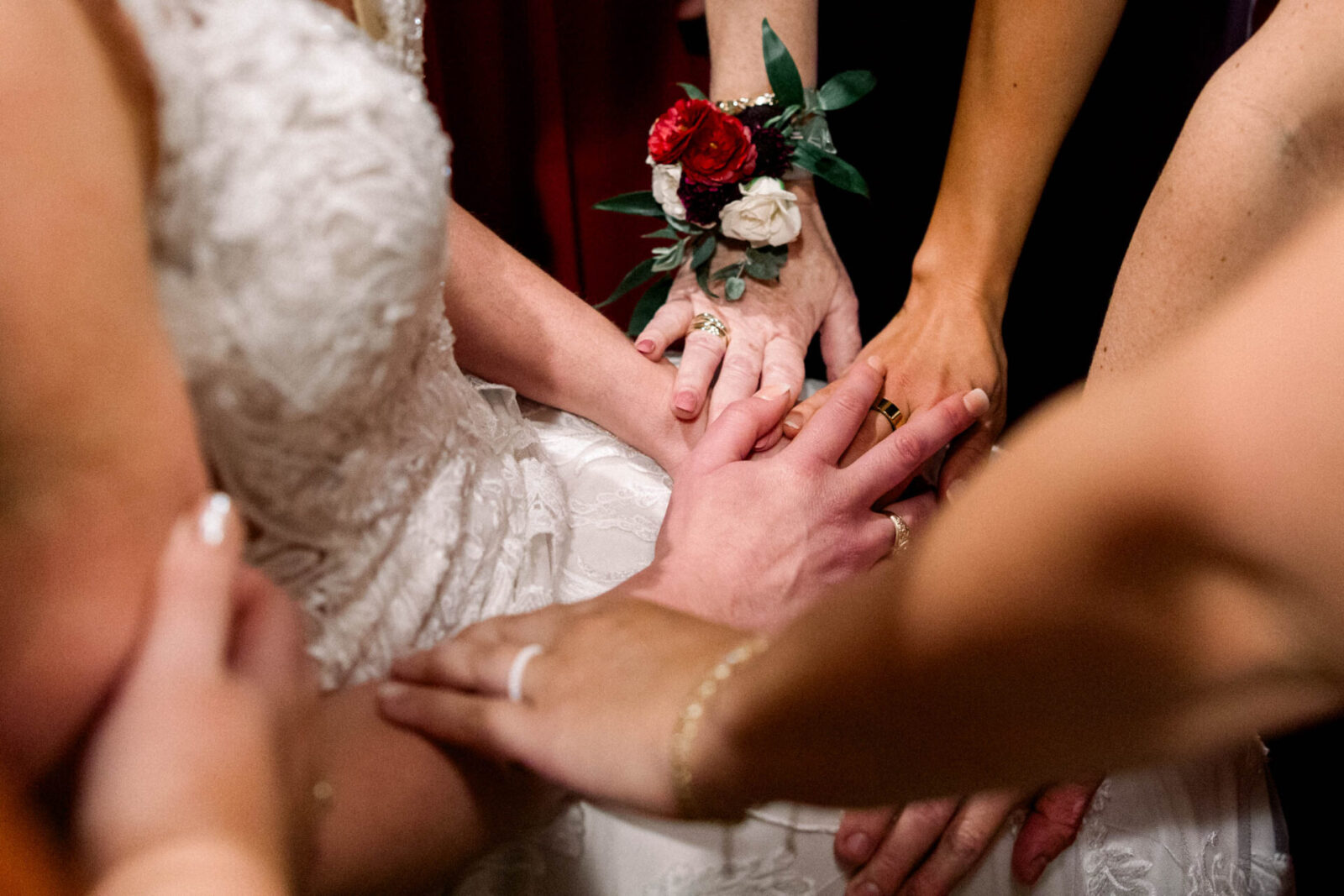 Hands on a bride as if praying